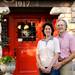 Lana Hawkins and Mike Soltis pose for a photo in front of the Stone Chalet Bed and Breakfast Inn on Wednesday, August 29, 2013. The pair recently purchased the property and are working to make improvements. Melanie Maxwell | AnnArbor.com